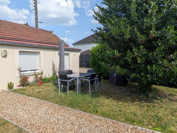 Charmante maison de pavillon avec jardin