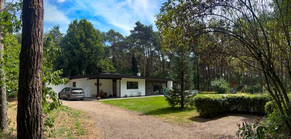 Grande maison familiale au milieu des bois