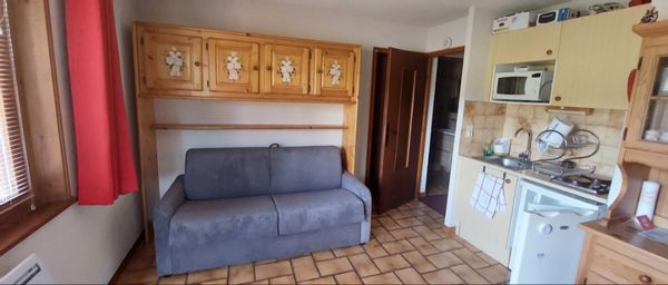 Cocon fleuri au pied des pistes avec garage fermé