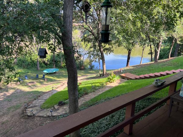 Lake Home in a country setting offers tranquility, yet conveniently close to Dallas or Fort Worth.