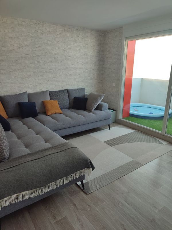 Appartement au dernier étage proche de toutes commodités avec vue sur les montagnes