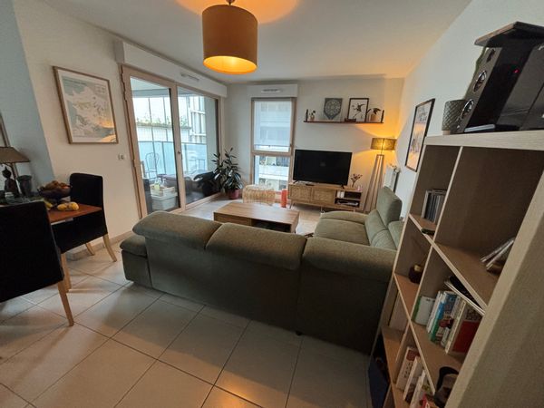 T3 lumineux 64m² Lyon 7e, 2 chambres, central, parking privé, proche transports et Rhône