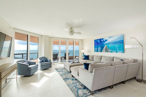 Luxury 3BR/3BA Sand Key condo. Renovated, resort amenities, steps to beach, water views everywhere.