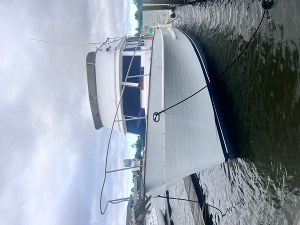 Shannon's houseboat with sailing vessel