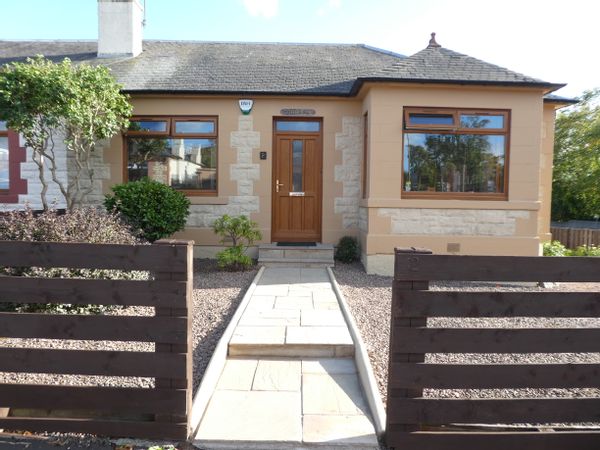 Extended semi-detached bungalow in Edinburgh with south facing gardens