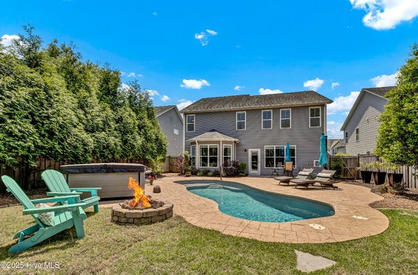 Wilmington NC Coastal Retreat with salt water pool, hot tub, and full gym!