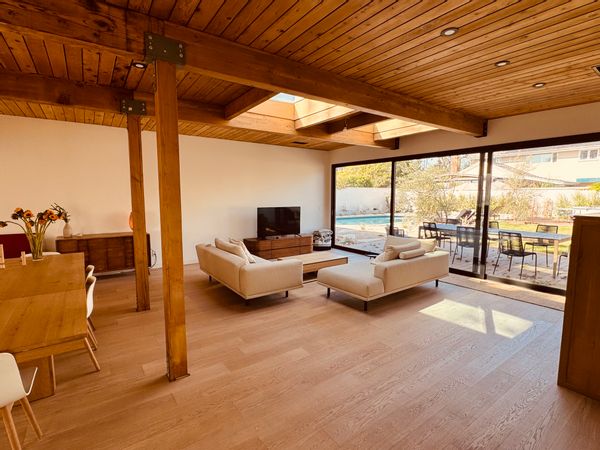 A 1950 mid century bright, minimalist Japandi style bungalow with pool and big garden.