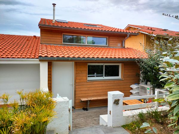 Maison entre dune et océan