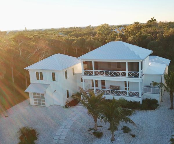 5 bedroom architecturally designed home with private swimming pool.    Steps to town and the beach