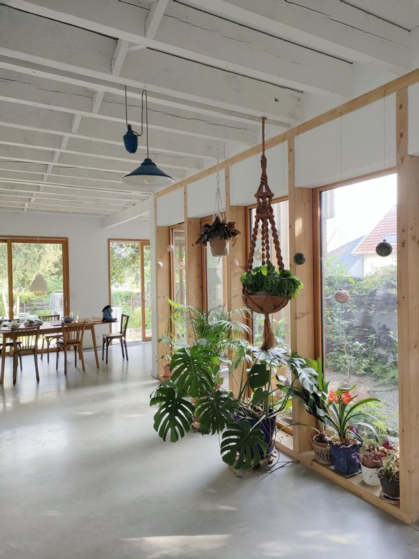 An unusual and very bright house with a quiet garden, right in the center of a pretty town