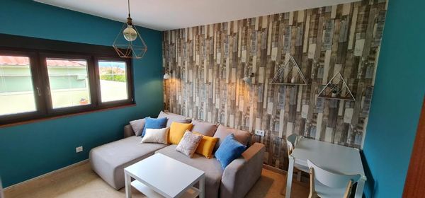 Casa Caxota: planta baja con terraza y vistas al Atlántico en Fisterra