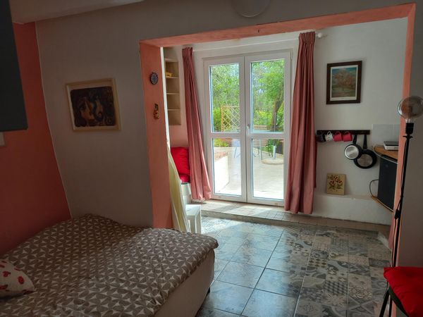 Anne's house is a small, but smartly designed mini-studio with a private terrace and a stunning view