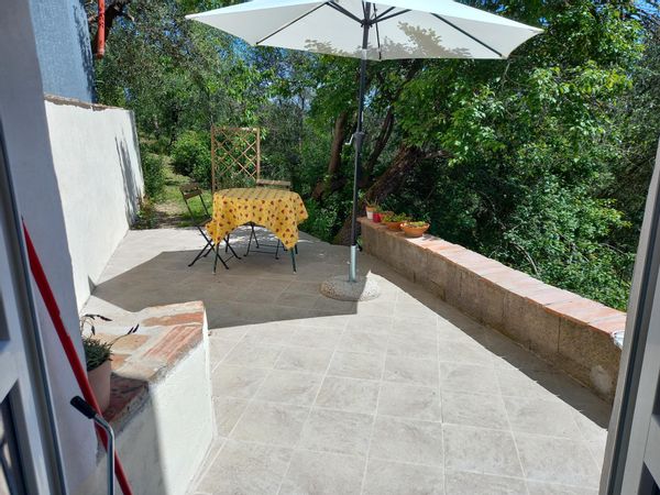 Anne's house is a small, but smartly designed mini-studio with a private terrace and a stunning view