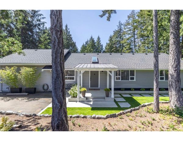 Three bedroom home nestled in a beautiful forest setting minutes from the ocean and hiking trails.