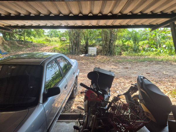 Rural southwest east Thailand, traditional style with contemporary features.