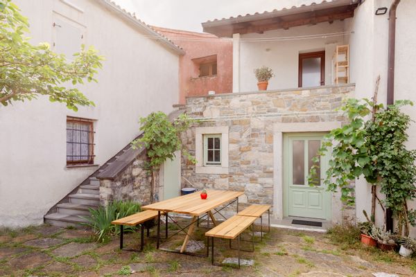 A cosy stone house with a rustic courtyard in the heart of Slovene Istria.