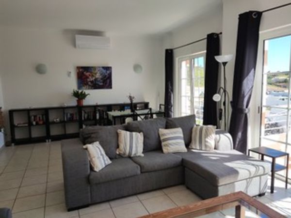 Beautiful 2-bedroom, 2-bathroom townhouse, terraces, shared pool by golf course and near coast.