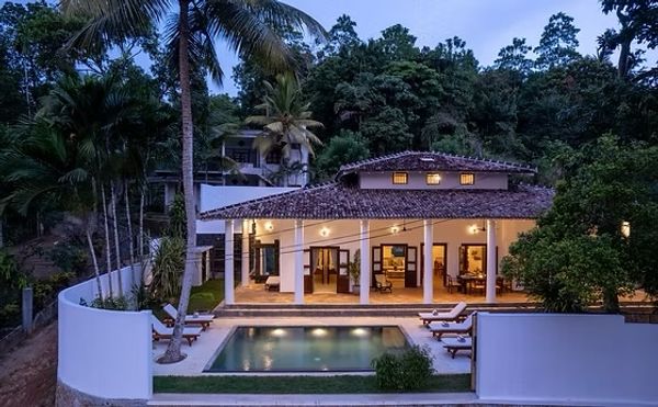 Luxury villa 8 mins from the beach. Swimming pool overlooking lush paddy fields where peacocks roam