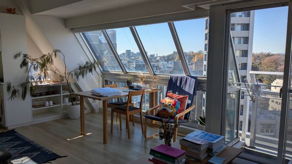 Top-floor Tokyo duplex: Views of Mt. Fuji & city, large windows, balcony, great nearby dining.