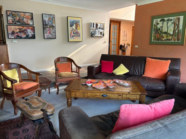 Single-level suburban familty home with pool and patio