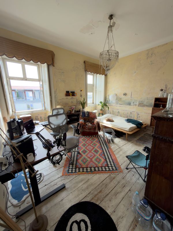 A cozy room in a 3 bedroom artsy apartment. The most charming house you'll come across in Lisbon.