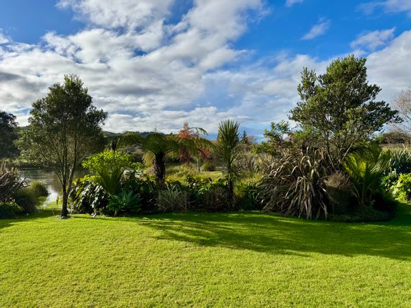 We offer a self contained studio, next to our main house with a beautiful garden, next to a river.