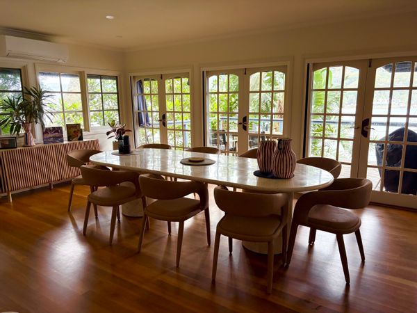 Escape to your own island paradise with private sandy beach, boatshed & rooftop sunsets!