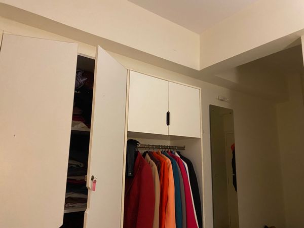 It’s a decent small room for one person with a working desk and warm lights , wifi facility and common kitchen plus private bathroom