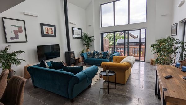 House is Architect designed modern detached home offering stylish open plan living with log burner .