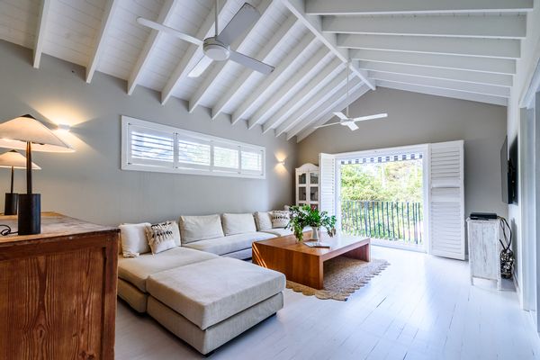 Three-bedroom house across the road from the beach with large front yard and backyard and fireplaces