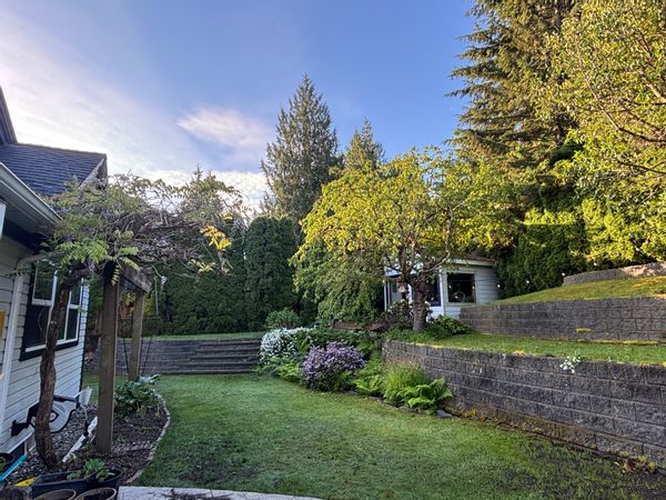 Inviting family home and yard very close to biking and hiking trails, lakes, golf, climbing and more