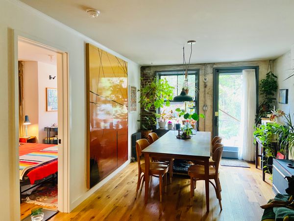 Bedroom in a cozy Greenpoint apartment with a private garden.
