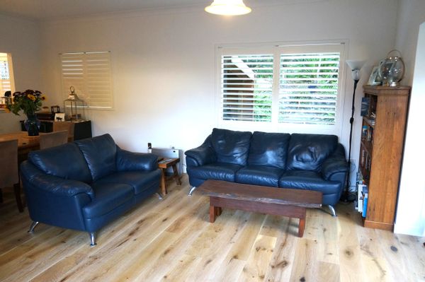 Second bedroom with own but separate bathroom and access to common living area with hosts.