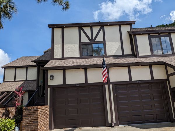 Tami's 2nd floor condo with wide open windows with view of the beautiful trees!