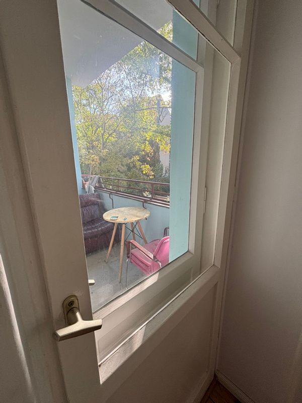 A warm, airy nest where trees whisper through every window, inviting you to rest, create, and dream.