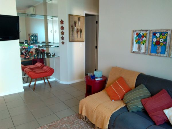 Apartamento na Praia de Thelma e Mauro