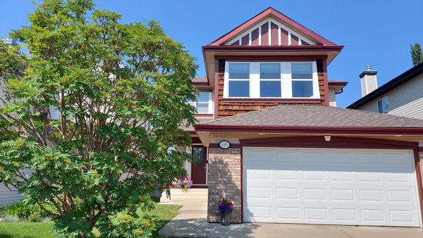 Our nice home and yard in the suburbs with ponds & green spaces and nearby shops & restaurants