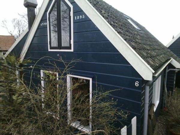 Marjan's authentic Dutch wooden country home 15 kilometers south of the city center of Amsterdam.