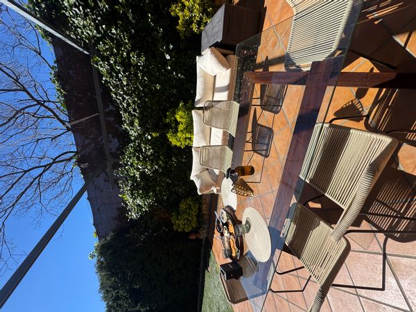 Sabrina's house has a garden area with a private bbq & community pool during the summer months.