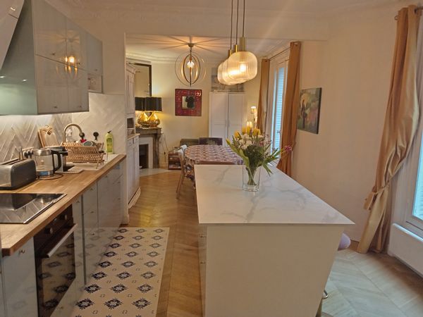 Appartement 3 chambres, grand espace à vivre, proche de la Tour Eiffel et des commerces, restaurants