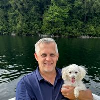 Sunset, drinks, snacks and bonfire on the dock (lake)